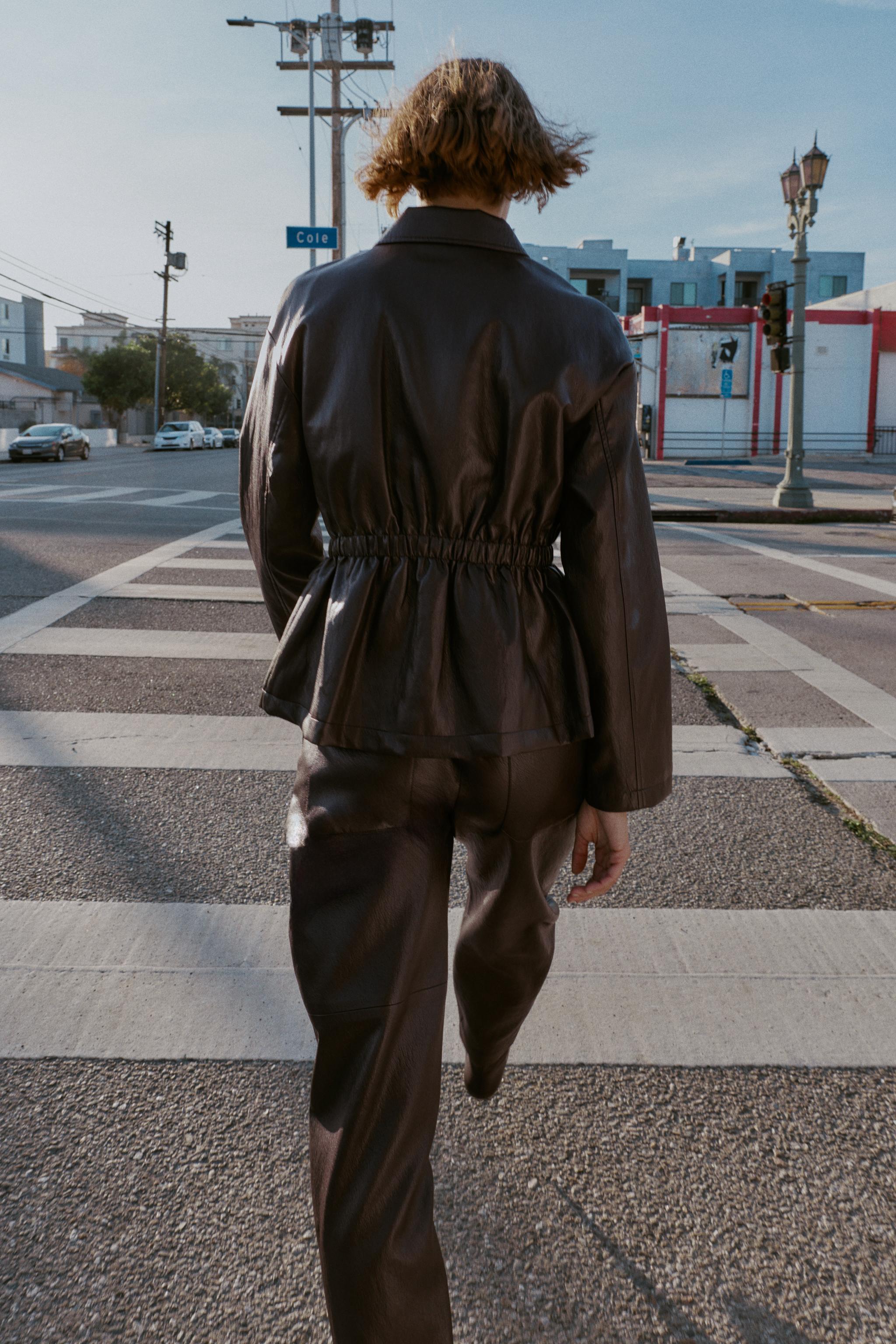 ELASTIC WAIST FAUX LEATHER JACKET